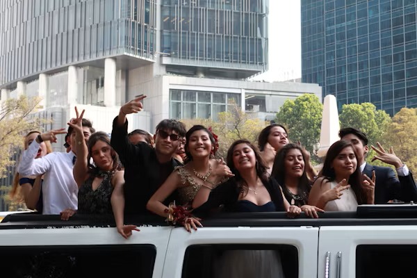 Happy customers enjoying luxury limousine service from www.freightmove.pro during a memorable event.