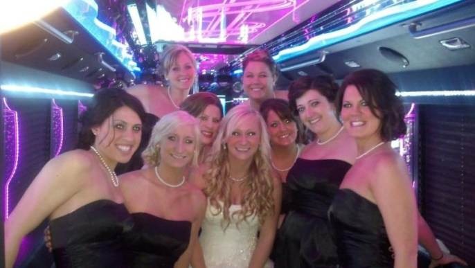 Happy customers enjoying luxury limousine service from www.freightmove.pro in a memorable experience.